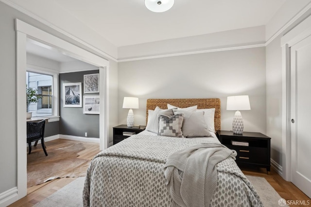 bedroom featuring hardwood / wood-style floors