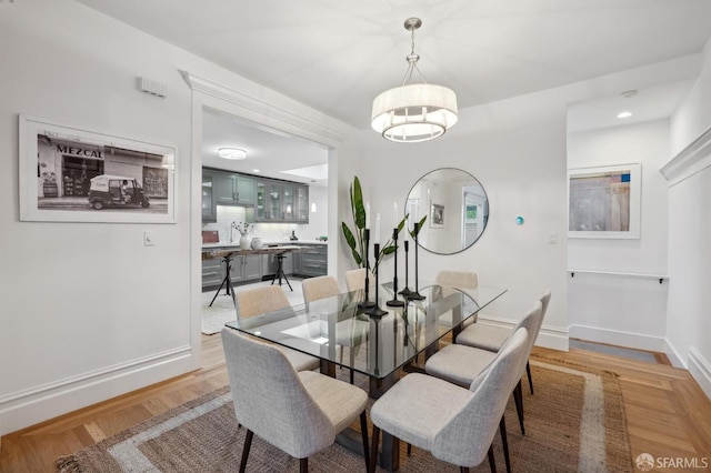 dining space featuring light hardwood / wood-style flooring