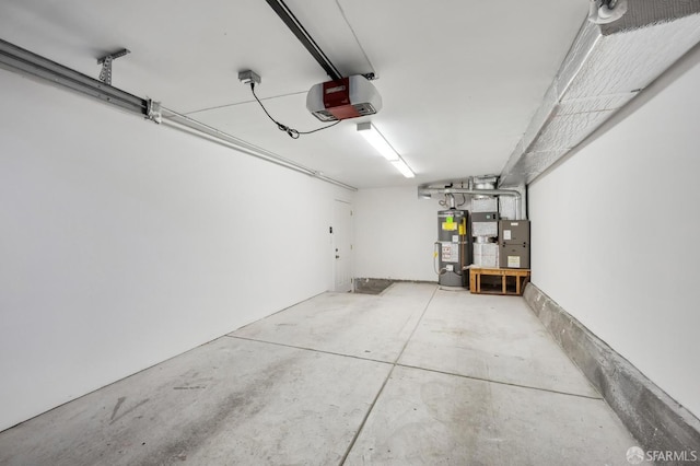 garage featuring a garage door opener and gas water heater