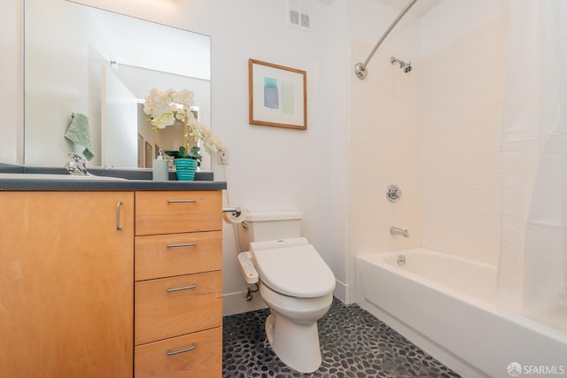 full bathroom with shower / bath combination with curtain, tile patterned floors, vanity, and toilet