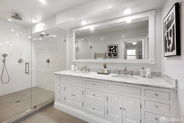 1758 Palou Ave, San Francisco, CA 94124 - bathroom featuring a shower stall, double vanity, and tile patterned floors