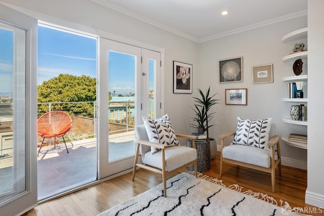 1758 Palou Ave, San Francisco, CA 94124 - living area with wood finished floors, crown molding, recessed lighting, and baseboards