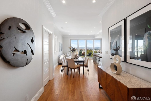 1758 Palou Ave, San Francisco, CA 94124 - dining space featuring crown molding, light wood finished floors, baseboards, and recessed lighting