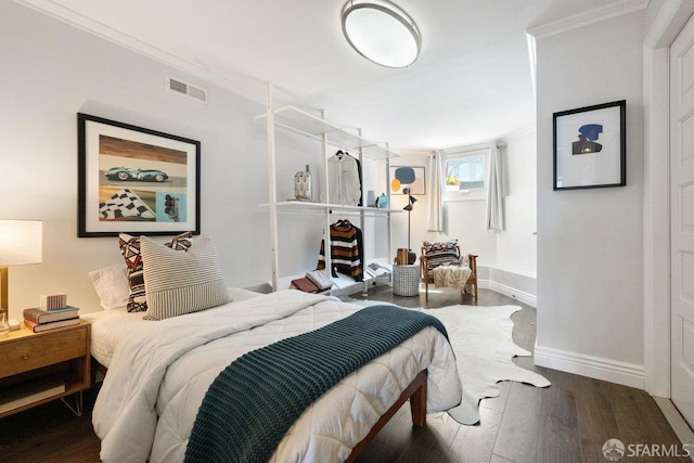 1758 Palou Ave, San Francisco, CA 94124 - bedroom with wood finished floors, baseboards, and crown molding