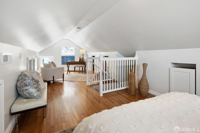 1758 Palou Ave, San Francisco, CA 94124 - bedroom with lofted ceiling, wood-type flooring, and baseboards