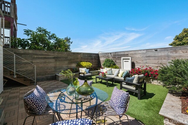 1758 Palou Ave, San Francisco, CA 94124 - fenced backyard with an outdoor hangout area