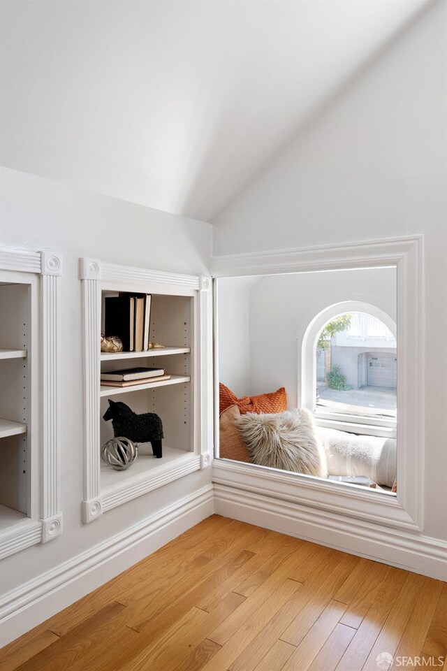 1758 Palou Ave, San Francisco, CA 94124 - unfurnished bedroom with lofted ceiling and wood finished floors