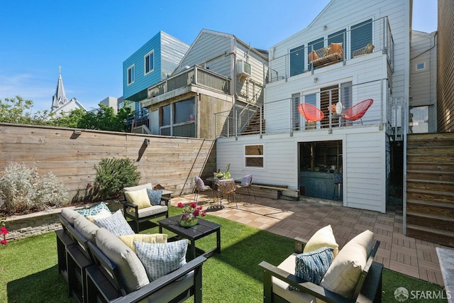 1758 Palou Ave, San Francisco, CA 94124 - rear view of house with an outdoor hangout area and a patio
