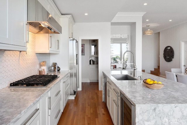 1758 Palou Ave, San Francisco, CA 94124 - kitchen featuring range hood, a sink, appliances with stainless steel finishes, wine cooler, and a kitchen island with sink