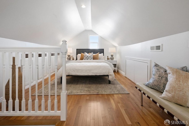 1758 Palou Ave, San Francisco, CA 94124 - bedroom featuring lofted ceiling and light wood-style flooring