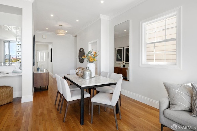 1758 Palou Ave, San Francisco, CA 94124 - dining space featuring wood finished floors, crown molding, baseboards, and recessed lighting