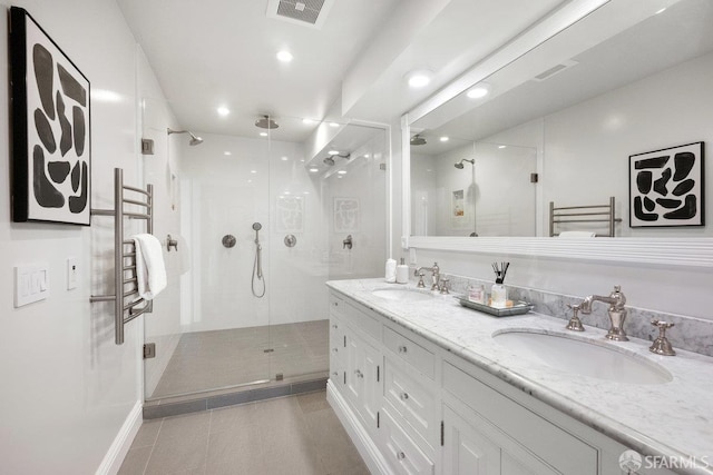 1758 Palou Ave, San Francisco, CA 94124 - full bathroom featuring a towel warmer, tile patterned flooring, a stall shower, double vanity, and recessed lighting