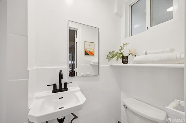 67 Rome St, San Francisco, CA 94112 - bathroom with toilet and tile walls