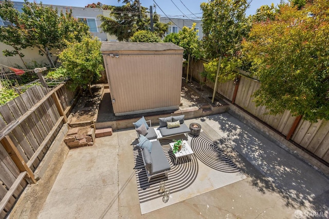 67 Rome St, San Francisco, CA 94112 - fenced backyard with a patio area, outdoor lounge area, and a storage shed