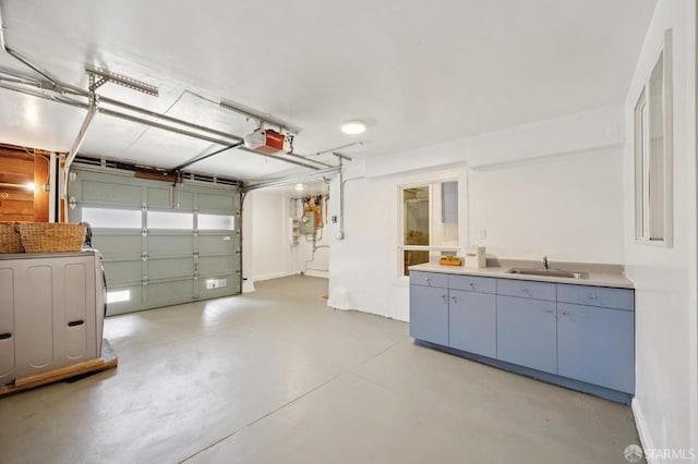 67 Rome St, San Francisco, CA 94112 - garage featuring a garage door opener and a sink