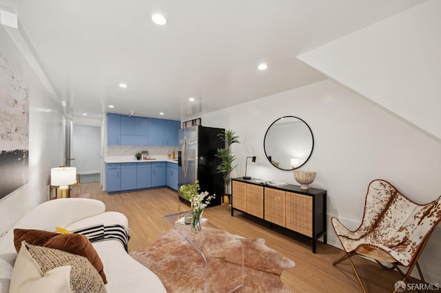 67 Rome St, San Francisco, CA 94112 - living room featuring light wood-style floors and recessed lighting