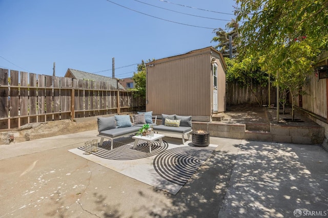 67 Rome St, San Francisco, CA 94112 - fenced backyard with a patio area, an outdoor hangout area, and a storage shed