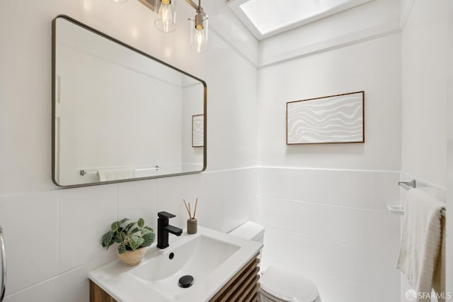 67 Rome St, San Francisco, CA 94112 - half bathroom with vanity and tile walls