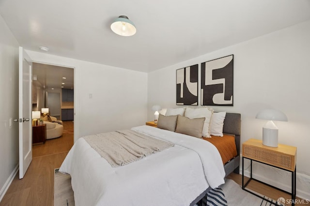 67 Rome St, San Francisco, CA 94112 - bedroom featuring wood finished floors and baseboards