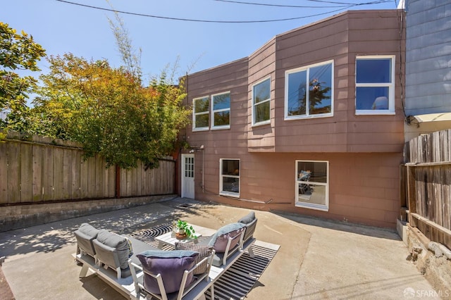 67 Rome St, San Francisco, CA 94112 - fenced backyard featuring a patio area