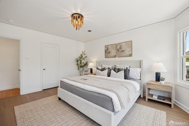 67 Rome St, San Francisco, CA 94112 - bedroom featuring wood finished floors and baseboards