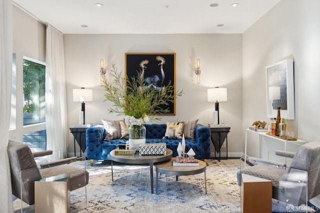 interior space with baseboards and recessed lighting