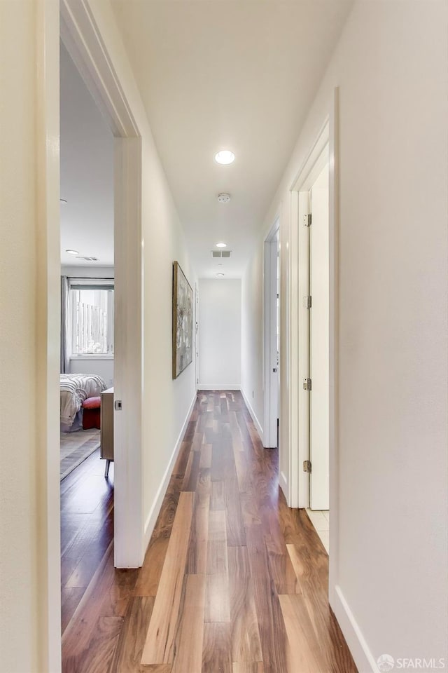 165 Summit Way, San Francisco, CA 94132 - corridor with wood finished floors, baseboards, and recessed lighting
