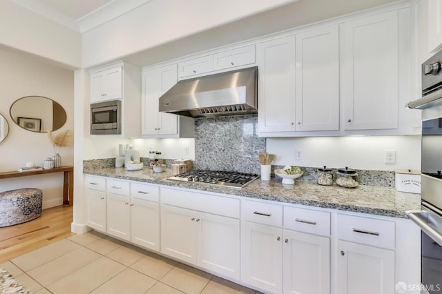 165 Summit Way, San Francisco, CA 94132 - kitchen with ventilation hood, appliances with stainless steel finishes, white cabinets, light stone countertops, and backsplash