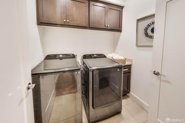 165 Summit Way, San Francisco, CA 94132 - washroom with cabinet space, washing machine and clothes dryer, light tile patterned floors, and baseboards