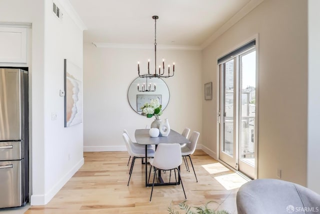 165 Summit Way, San Francisco, CA 94132 - dining room featuring a chandelier, crown molding, light wood finished floors, and baseboards