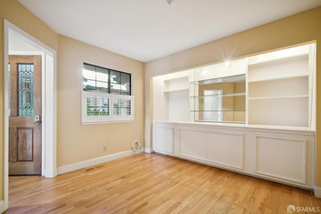 empty room featuring light hardwood / wood-style flooring