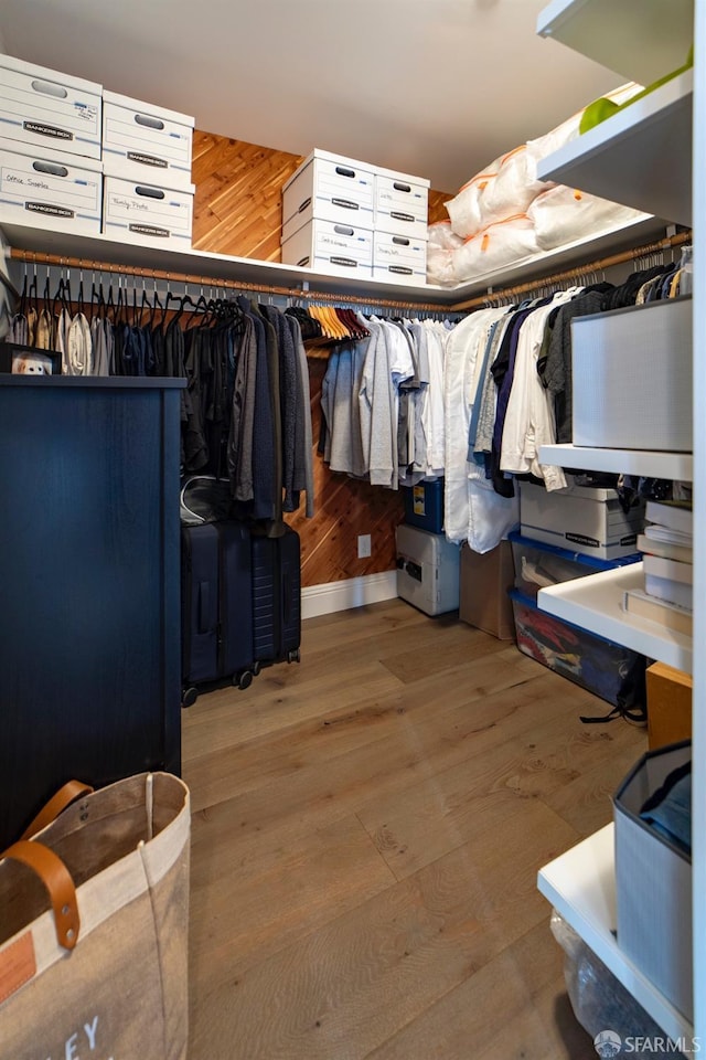 spacious closet featuring wood finished floors