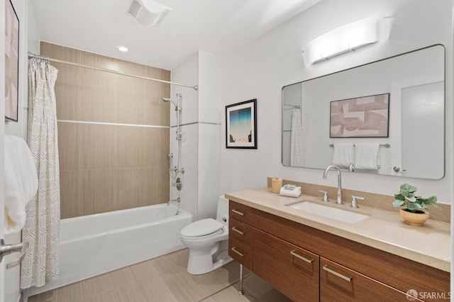 full bathroom with toilet, tile patterned floors, shower / tub combo with curtain, and vanity