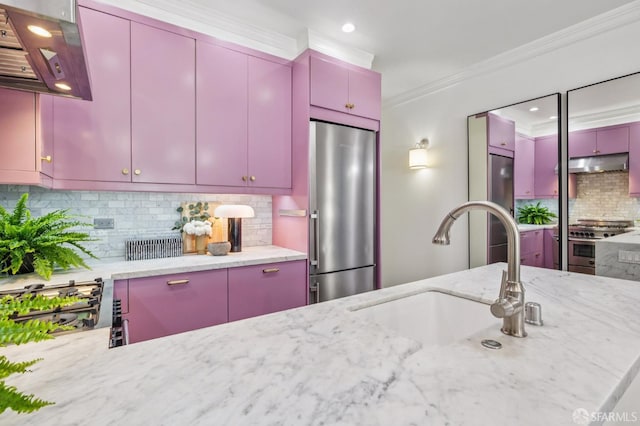 1144 York St, San Francisco, CA 94110 - kitchen featuring appliances with stainless steel finishes, red cabinets, under cabinet range hood, a sink, and ornamental molding