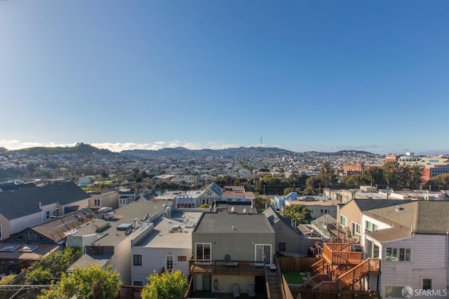 birds eye view of property with a mountain view