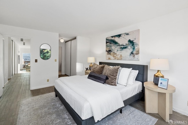 bedroom featuring hardwood / wood-style floors