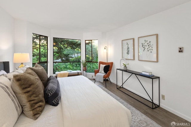 bedroom featuring dark hardwood / wood-style floors