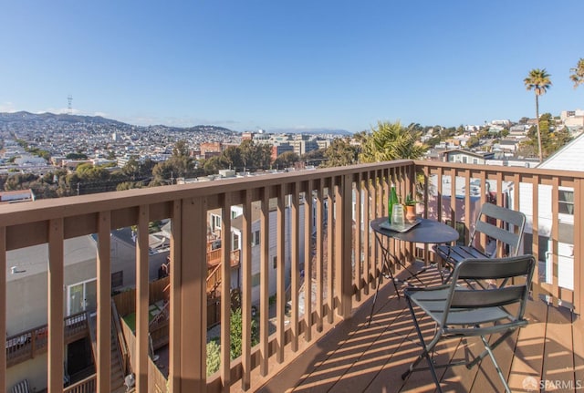 balcony featuring a mountain view