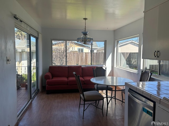 sunroom featuring a healthy amount of sunlight