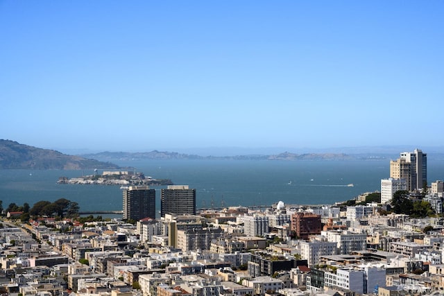 city view with a water and mountain view