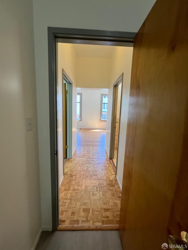 hall featuring light parquet flooring