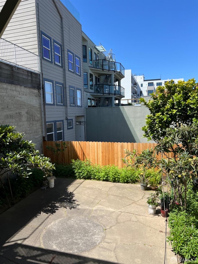 view of patio with a balcony