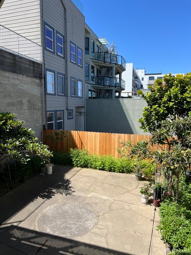 view of patio with a balcony