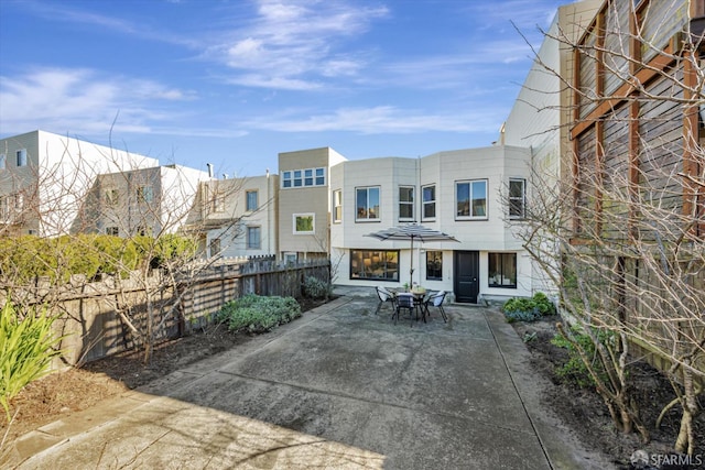 back of house featuring a patio area