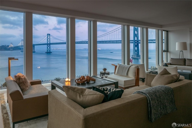 living room featuring a water view