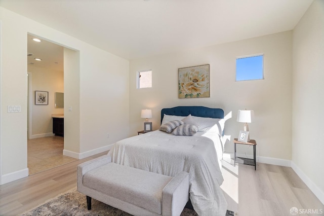 bedroom featuring light hardwood / wood-style flooring