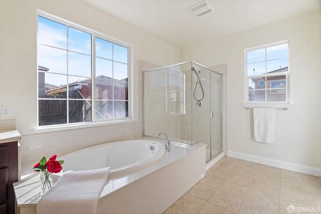 bathroom featuring vanity, tile patterned floors, and independent shower and bath