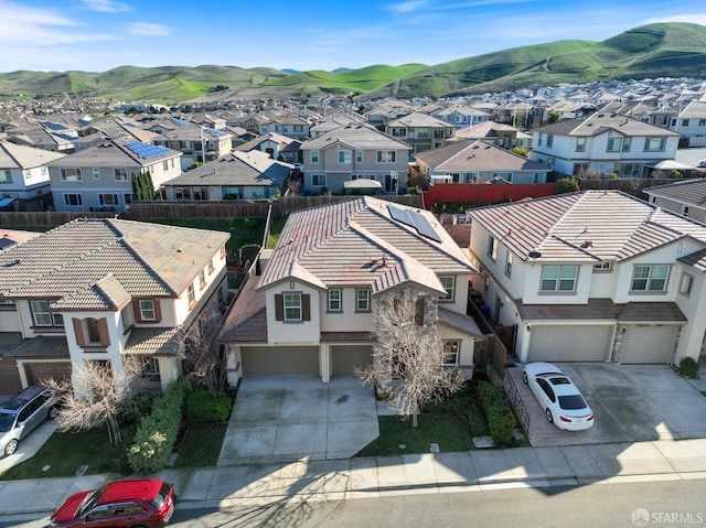 drone / aerial view featuring a mountain view