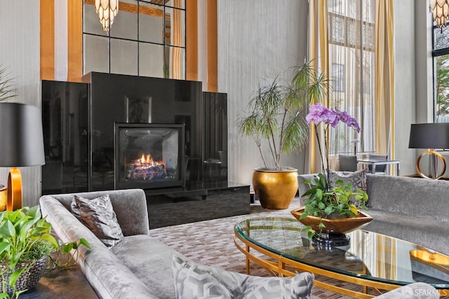631 Ofarrell St Unit 812, San Francisco, CA 94109 - living area with a warm lit fireplace and a high ceiling