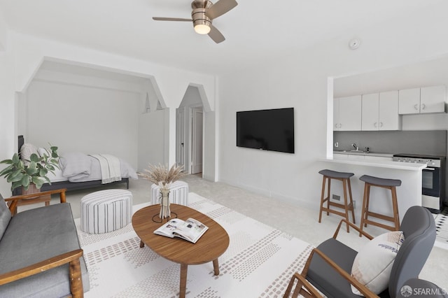 631 Ofarrell St Unit 812, San Francisco, CA 94109 - living room with a ceiling fan and light colored carpet